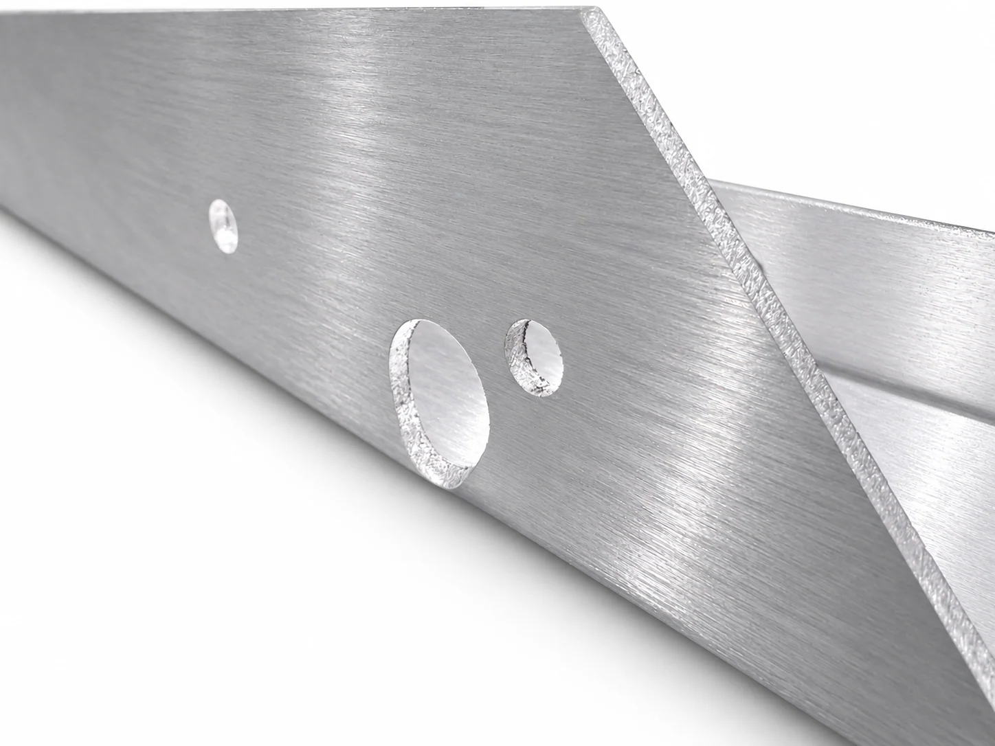 Illustrated bent sheet-metal flange with a distorted large opening and smaller neighboring holes