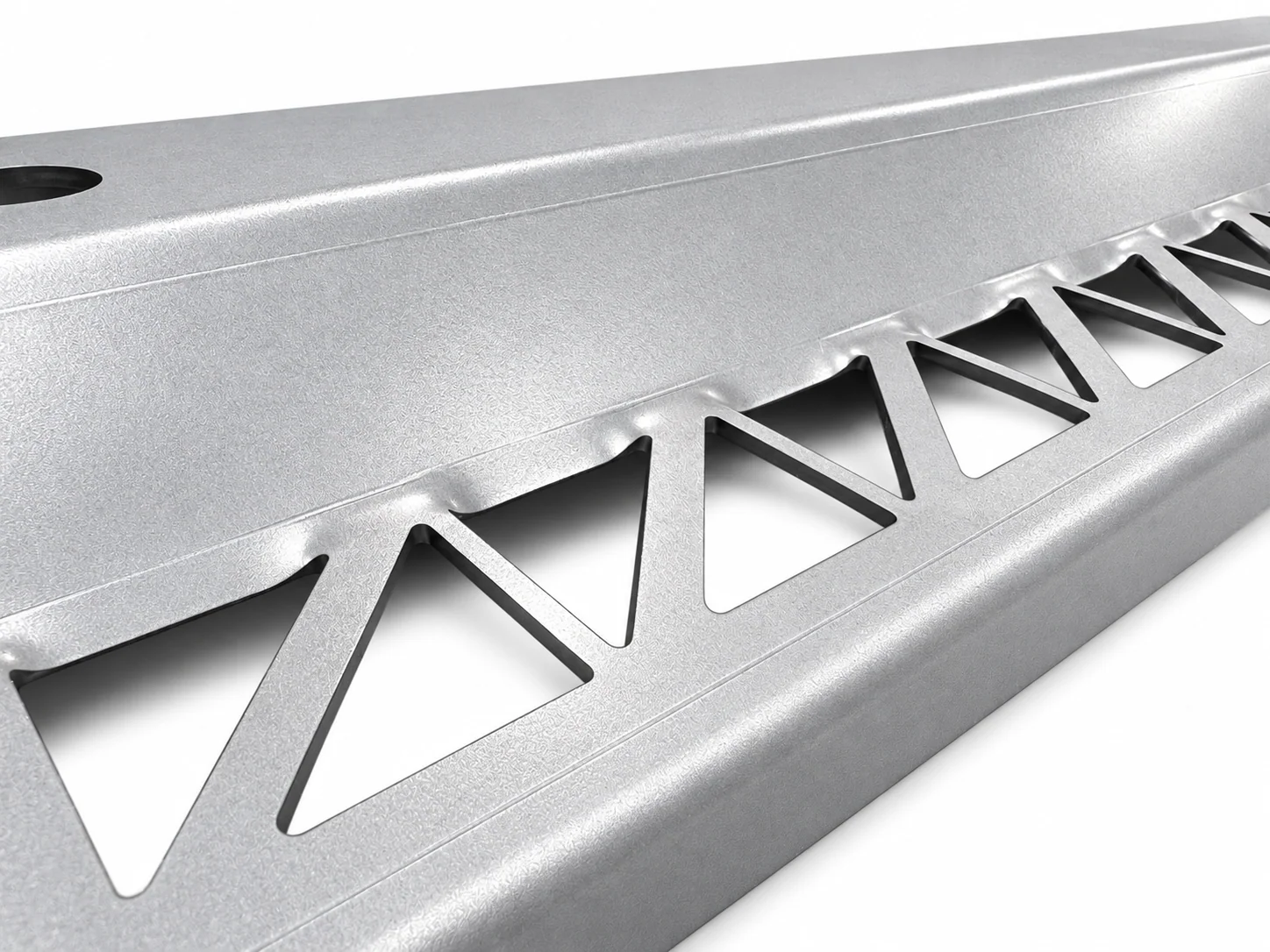 Illustration of triangular sheet-metal cutouts with scalloped upper edges beside a bend