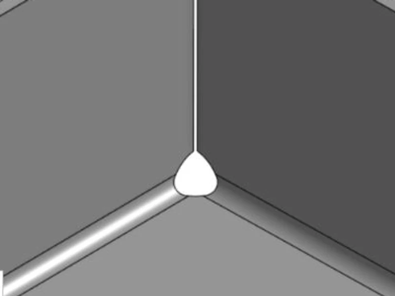 Formed box corner with a round sized corner relief: a teardrop-shaped opening where the walls meet the floor