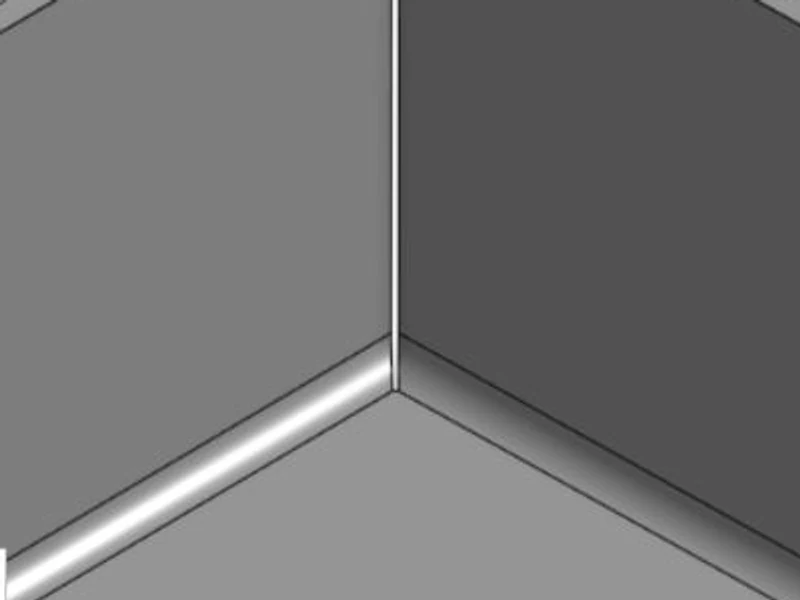 Formed box corner with a closed corner relief: the two walls meet at a tight vertical seam with almost no opening at the base