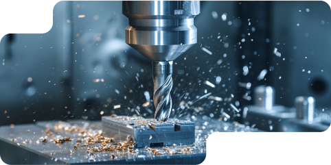 CNC machine drilling metal with precision, scattering sparks and shavings in a workshop setting.